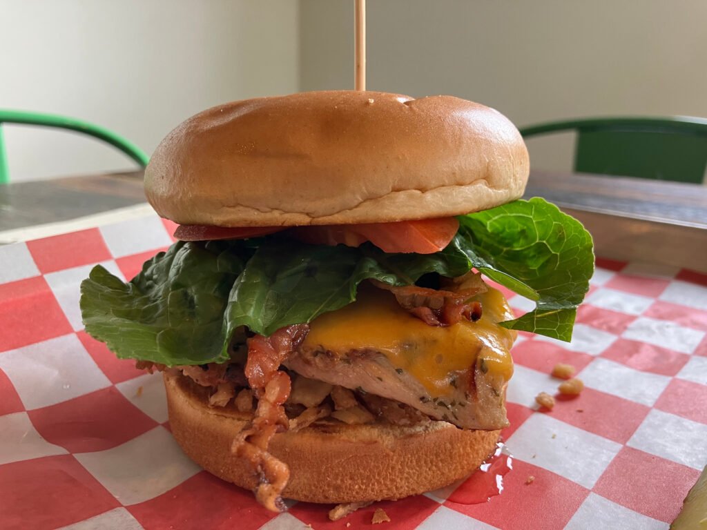 Hot Honey Crunch Sandwich at Planted Flag on a tray