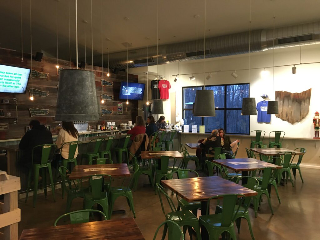 nterior of the Planted Flag Brewing taproom in Medina, Ohio, showing the welcoming space where guests can gather for food, drinks, and events.